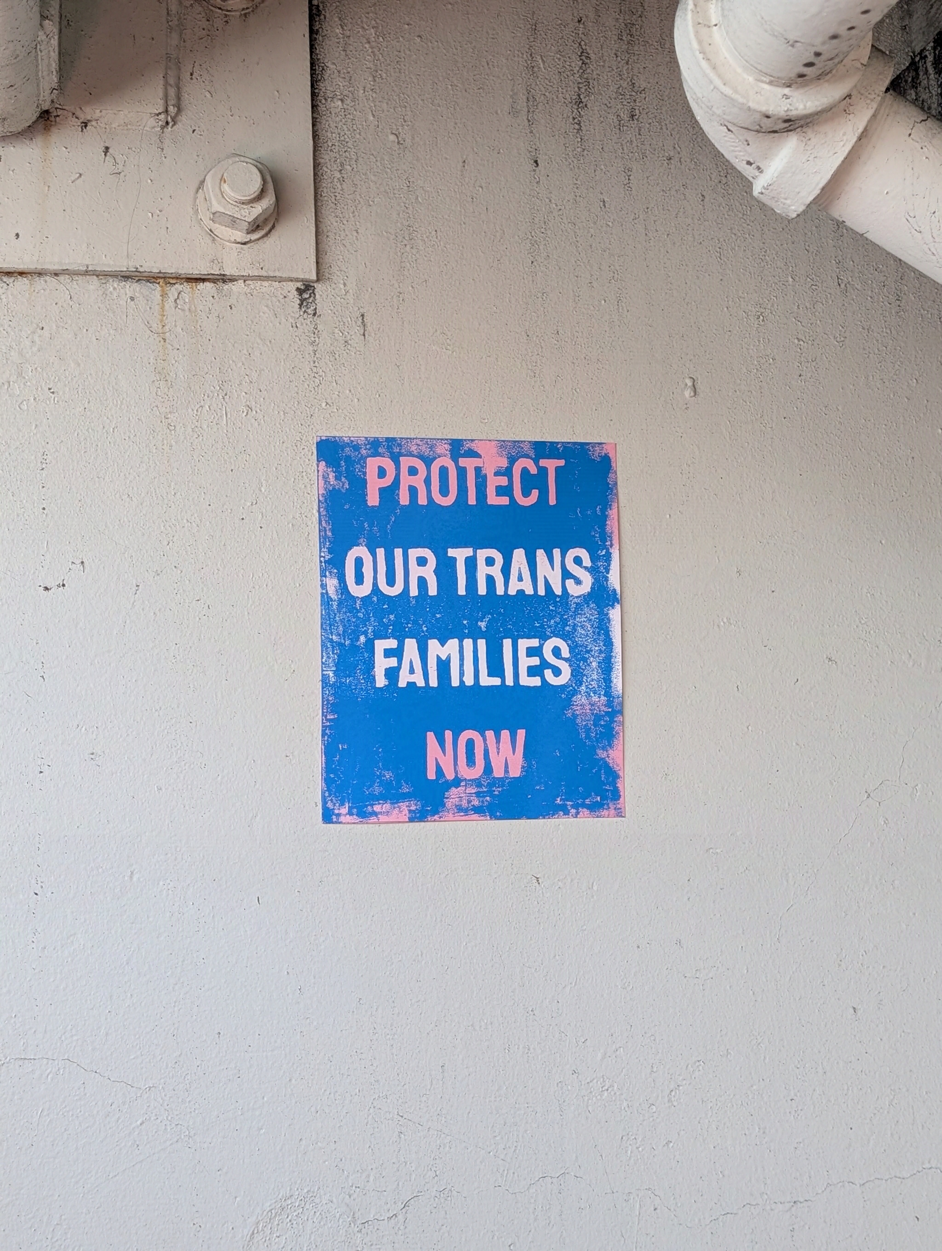 A picture of the piece posted on a wall